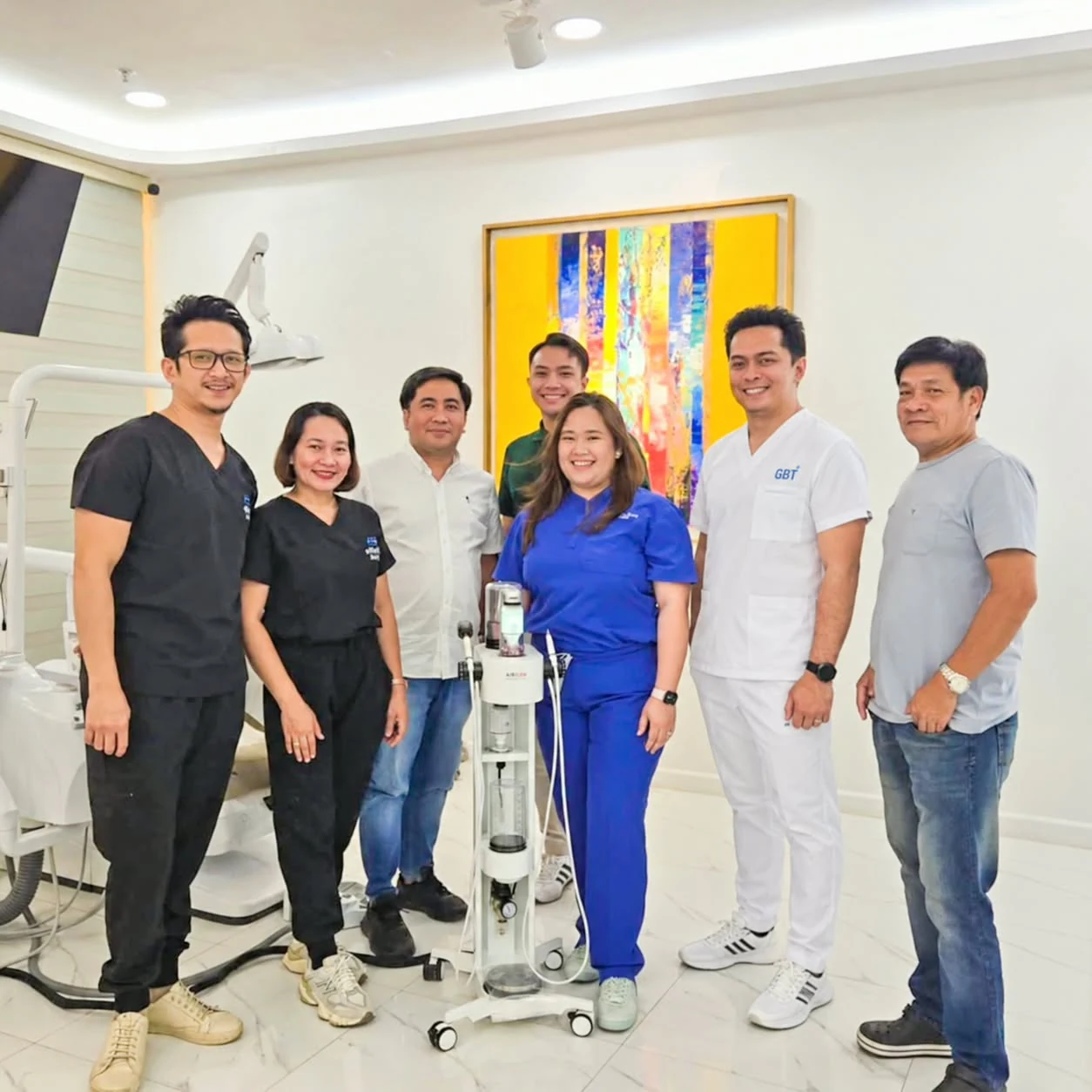 Dental professionals and SPMS representatives together with AIRFLOW equipment