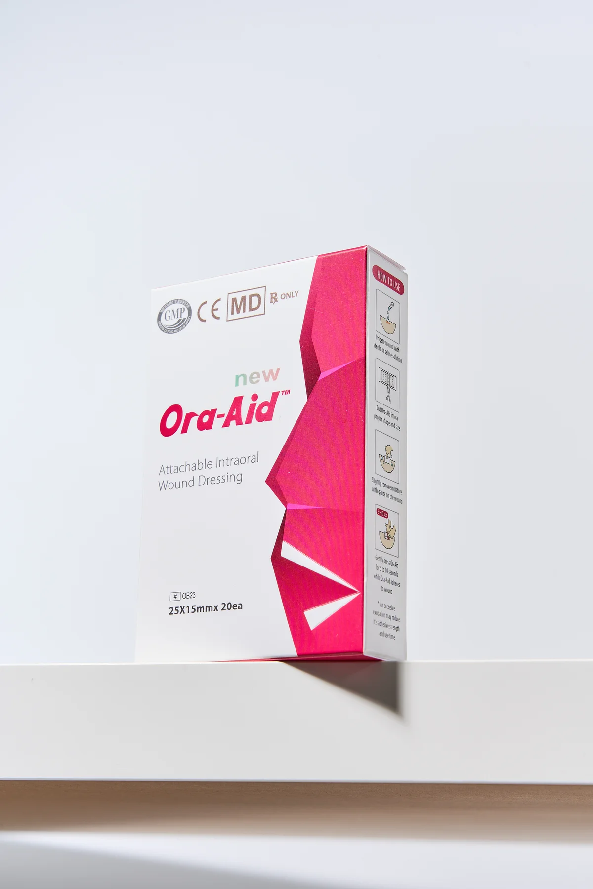 Pink Ora-Aid 25 by 15 mm intraoral wound dressing box